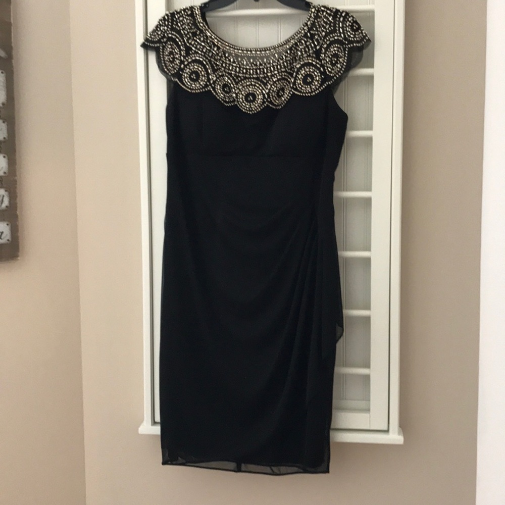 Black evening dress with gold beading